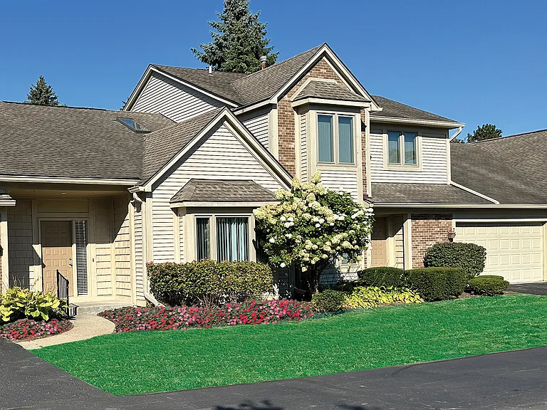 Super luxe privacy-loving townhomes with private patios, 2-car garages, full basement, high-end features.