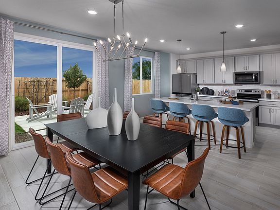 Residence 2 dining room modeled at a nearby Meritage community.