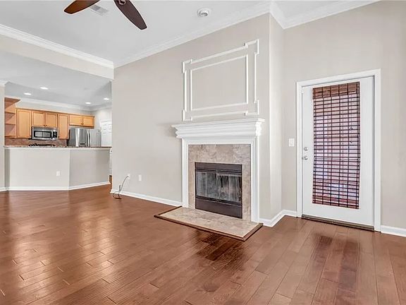 Traditional Wood-burning Fireplace in The Heart of The Living Room