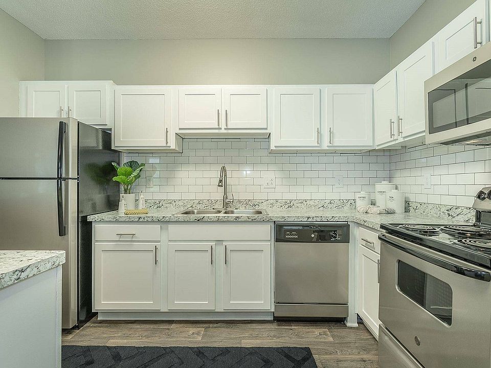 A gourmet kitchen designed for culinary enthusiasts at Avenues of Kennesaw in Kennesaw, GA.