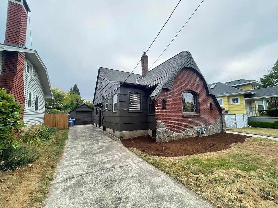 Front of house showing off street parking and detached garage.