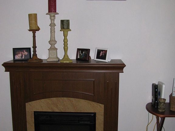 Moveable electric fireplace