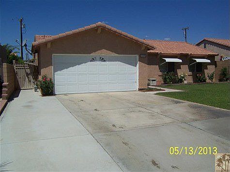 Extra wide driveway. Less maintance, more parking area.