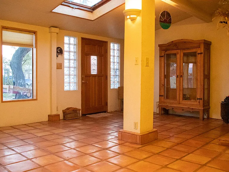 View of the front door and the sunroom