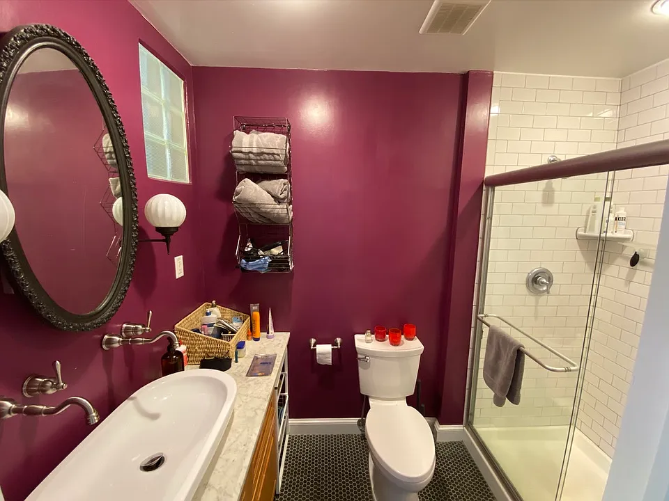 Bathroom with double sink and double shower
