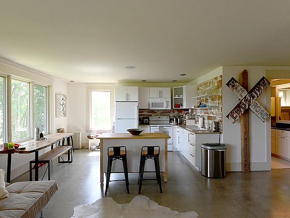 Kitchen off of living room.