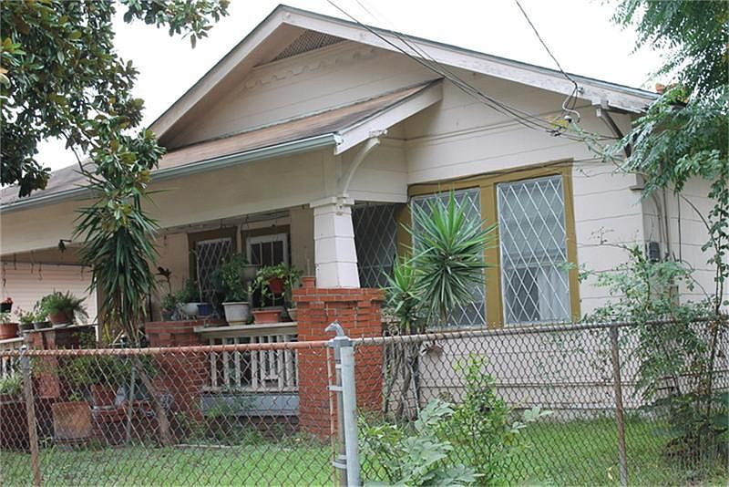 FENCED FRONT AND BACK YARD