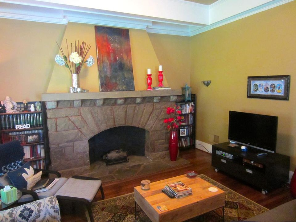 Living room with large fireplace