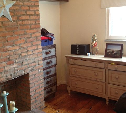 Bedroom Photo. Brick Firepla