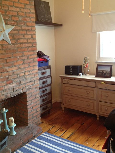 Bedroom Photo. Brick Firepla