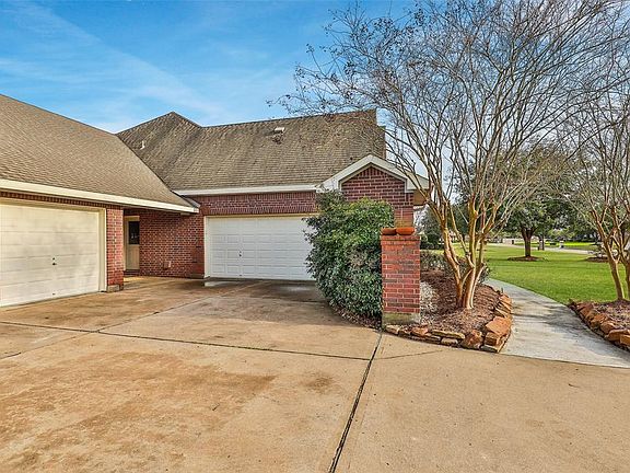 It's a true 3-car garage with a double wide bay and a single bay. Plus, there's a handy storage closet disguised behind the front brick wall. The side door leads into the utility room and mudroom.