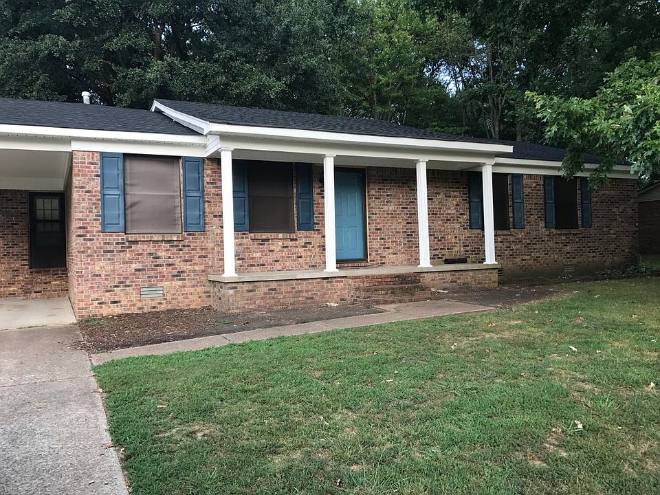 New roof and siding - Front of house - Carport