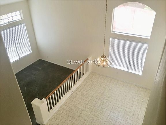 Looking down from the stairs at the DR and LV.  Seller's are offering a $!0,000 flooring allowance.  The interior, including the