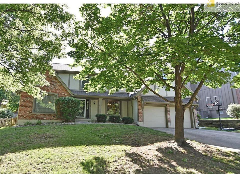 Welcome Home to this lovely home in the Blue Valley School District!