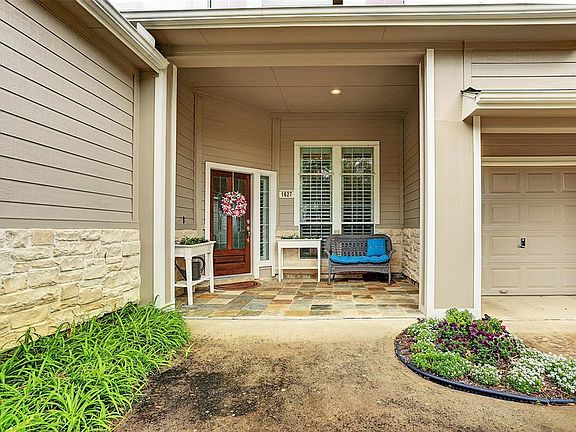 Covered front porch welcomes your family and friends