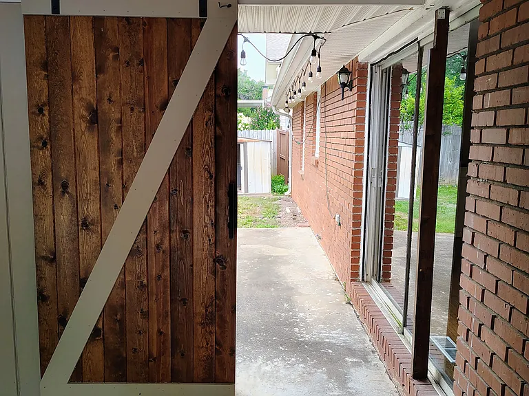 Barn Door in Garage to Patio / Backyard