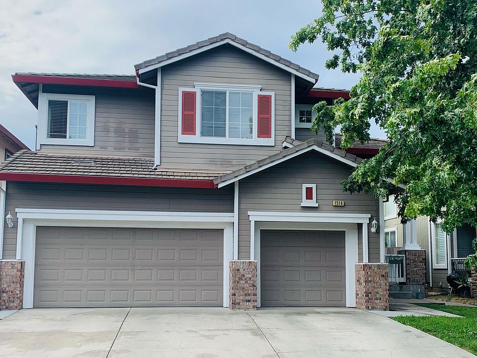 Front of house--3 car garage