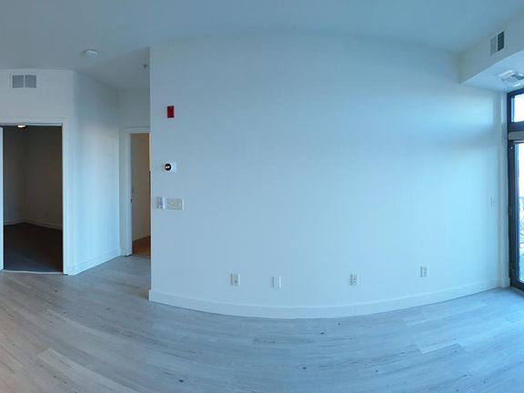 Light and airy space with a balcony directly off the living area.