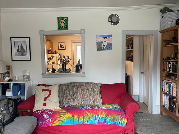 Living room facing away from the heater toward the kithen.