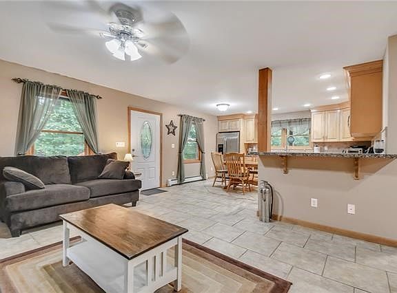 Open concept eat in kitchen, living and dining room provides flexibility and tons of space