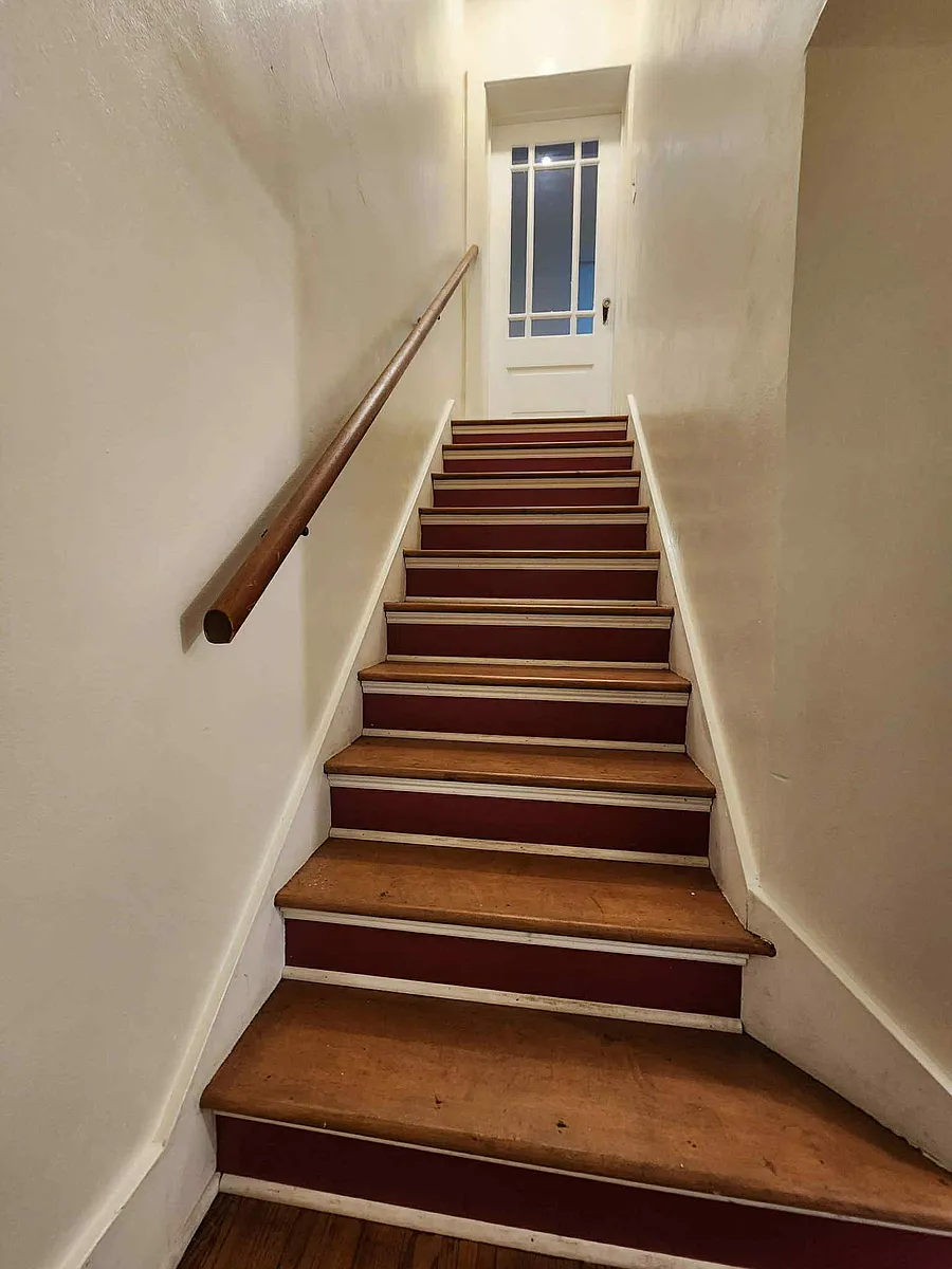 Stairwell up to the flat - 419 E Milwaukee Ave