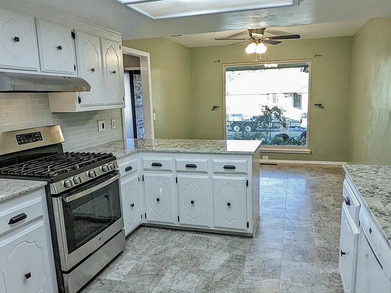 Kitchen and informal dining. Excellent Gas Stove (with an option for electric) and vented hood (no more smoke while cooking). Marble Easy to clean marble floors that will stand up to heavy foot traffic and pets.