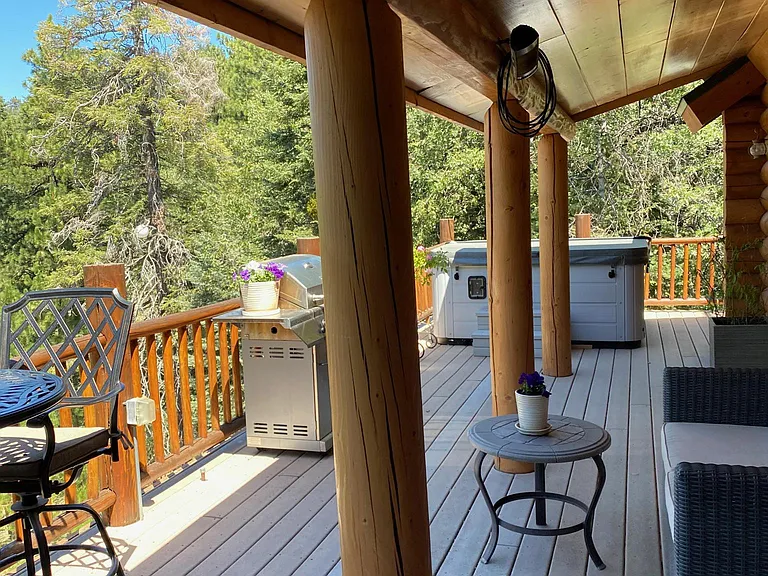 Back deck with outdoor spa