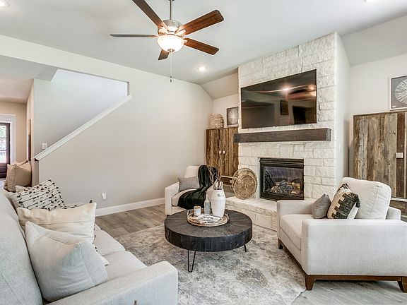 Living room of Stone Eagle home in Azle, TX by Kindred Homes