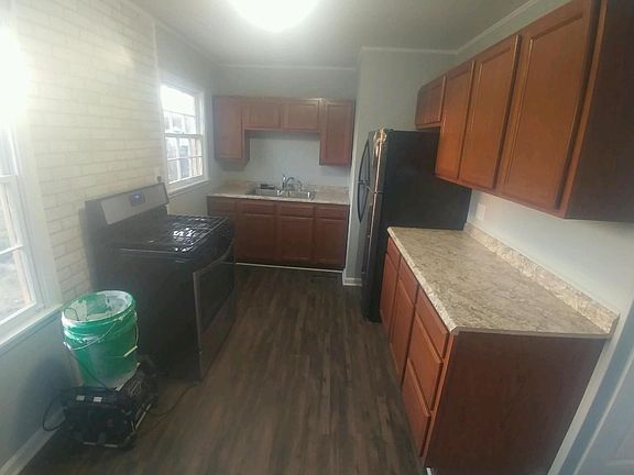 New kitchen features new floors, countertops and appliances 