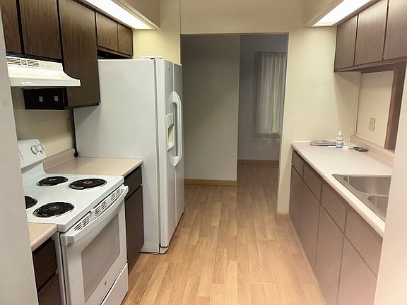 Kitchen looking into Breakfast Room on right and Entry Hall on left