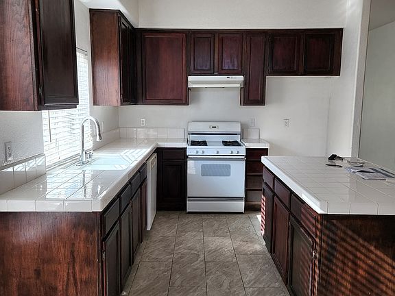re-stained cabinets in 2023