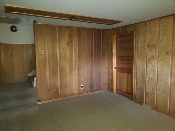 Part of living, could be used as dinning area, door to the right is the laundry room.