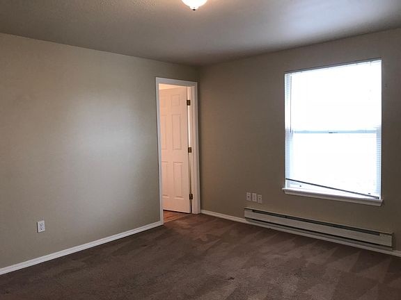 Master bedroom. Bathroom door in view