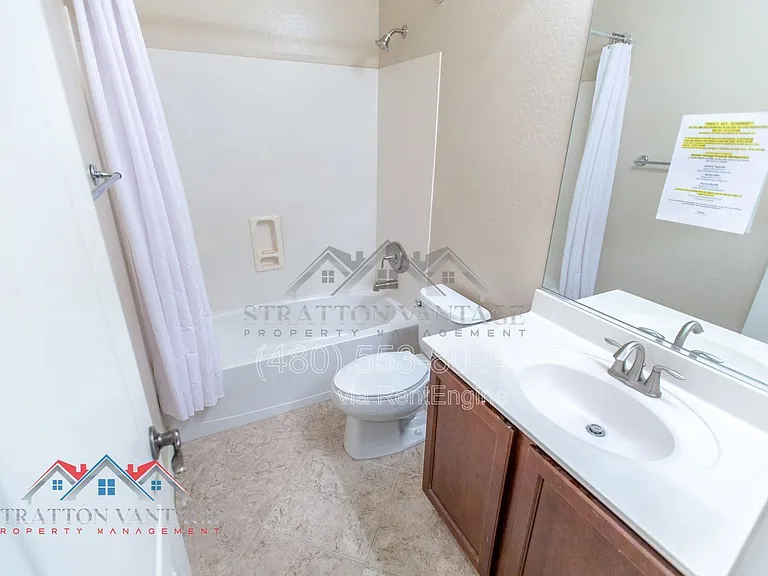 11751 W Daley Ln — Photo 29