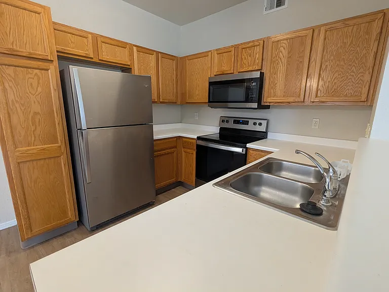 Ample kitchen cabinet storage.