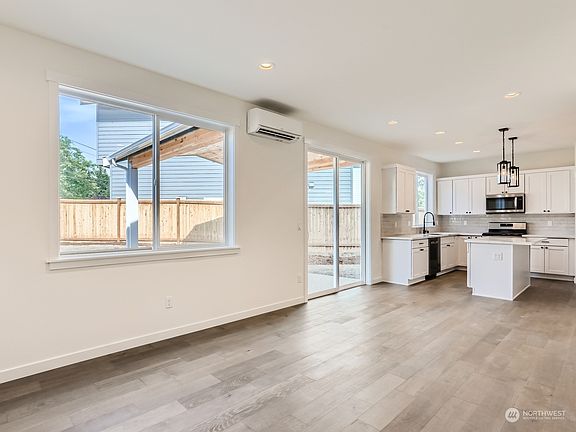 Great Room Open to Kitchen and Covered Patio>
