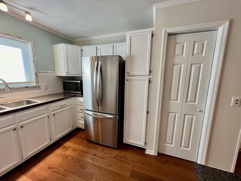 Kitchen with Stainless Steel Appliances and Granite Countertops