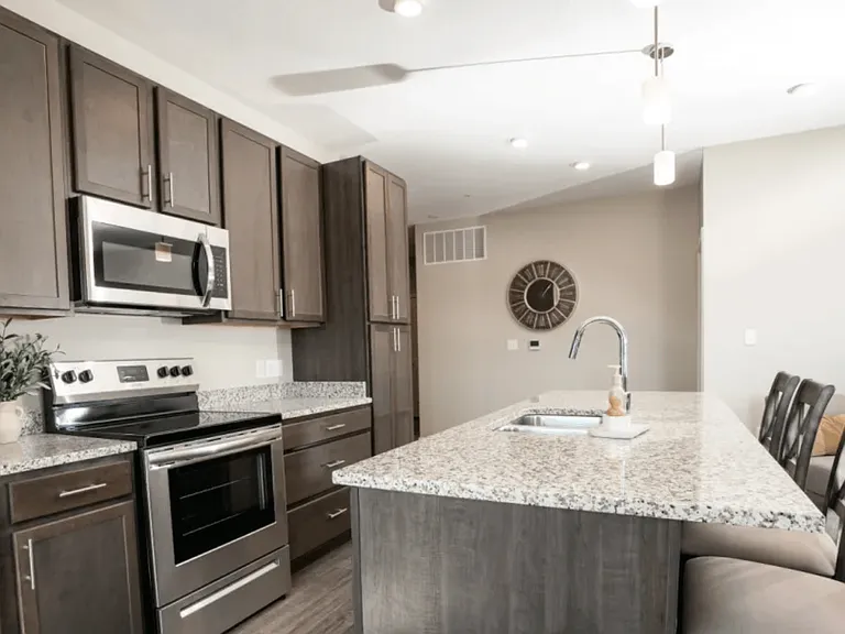 Stainless steel appliances in a unit at Heartland Flats North Platte.