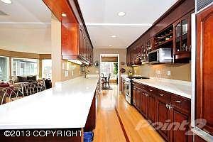 Custom Cherry Cabinetry w/Contrast Tops