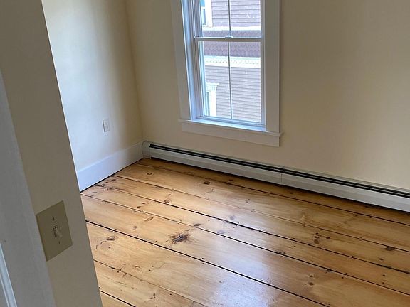Second bedroom with hardwood floors