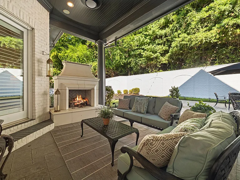 Sitting Area and Fireplace off Sunroom and Great Room