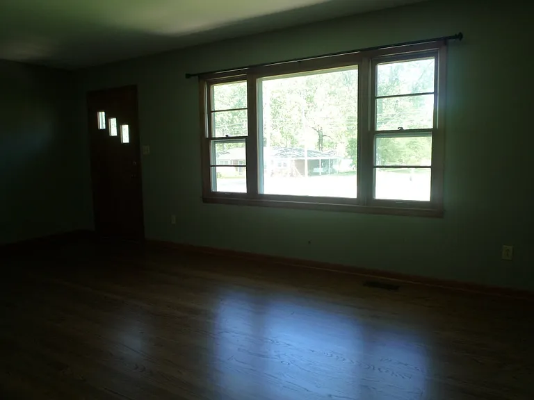 Large living room incorporated the original formal dining area into all living space.