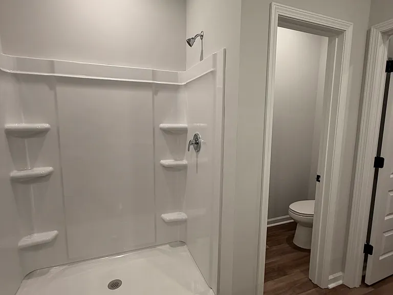 Shower and toilet room in primary suite