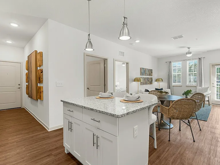 Experience the inviting ambiance of this chic open-concept living space, perfect for relaxation and entertaining.