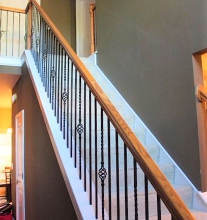 Staircase w/iron balusters
