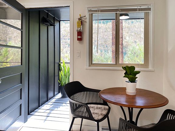 Bright and beautfiul- view of kitchen table and door to patio
