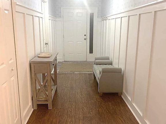 Entrance with bonus room and hall closet