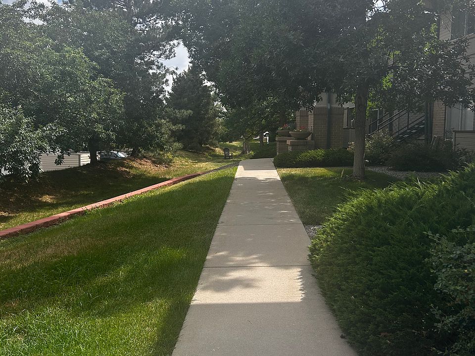 Sidewalk from the parking lot to the front door of the unit