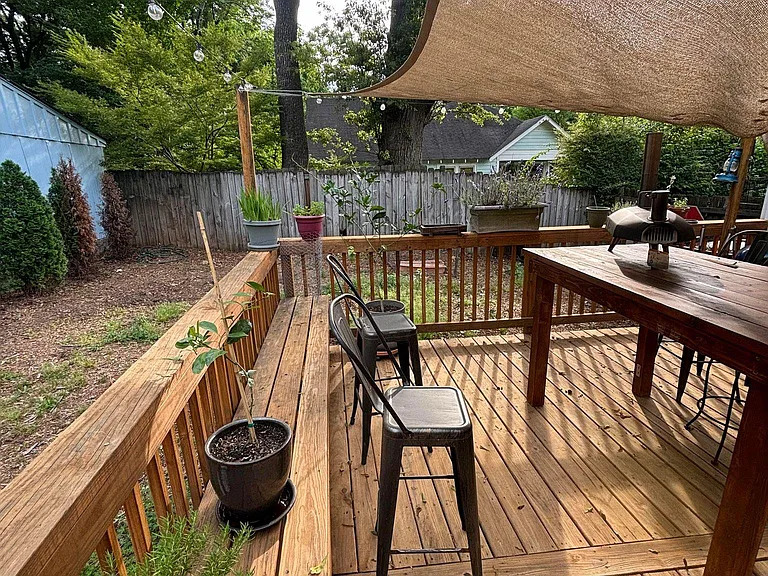 Very large deck. Door in hallway to bedroom 2 also has door out to deck.
