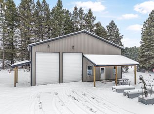 8074 Grosbeak Dr NW, Alden, MI 49612